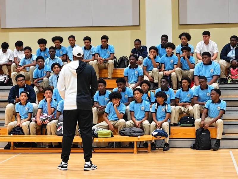 Cory McGee speaking to a gym full of students at a school talk | Cory McGee